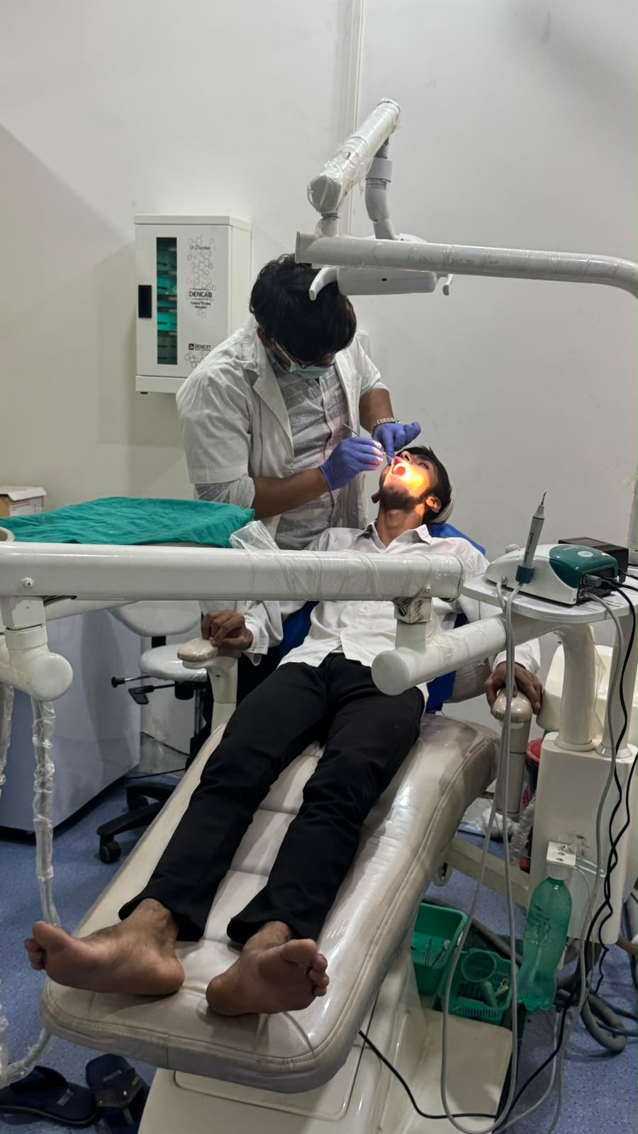 Dr. Rafique performing dental implant restoration
